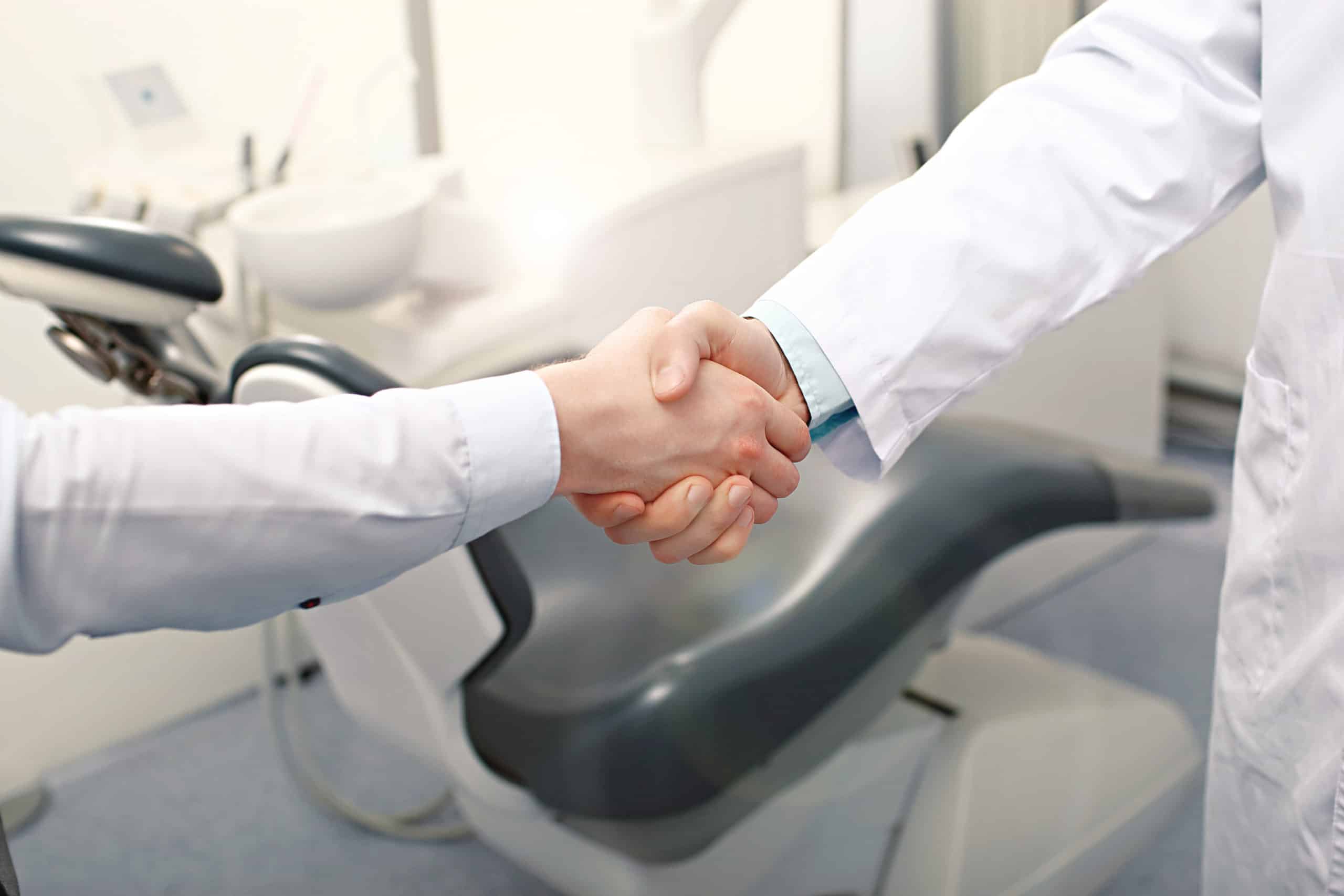 Dentists Shaking Hands