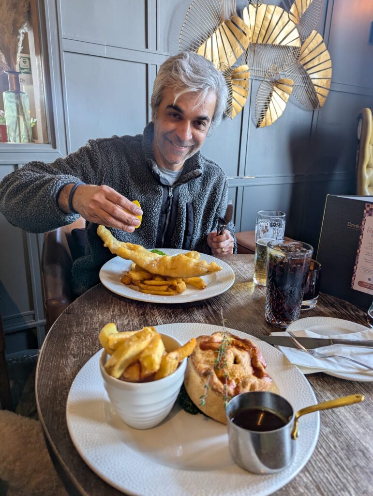 Arun eating fish and chips
